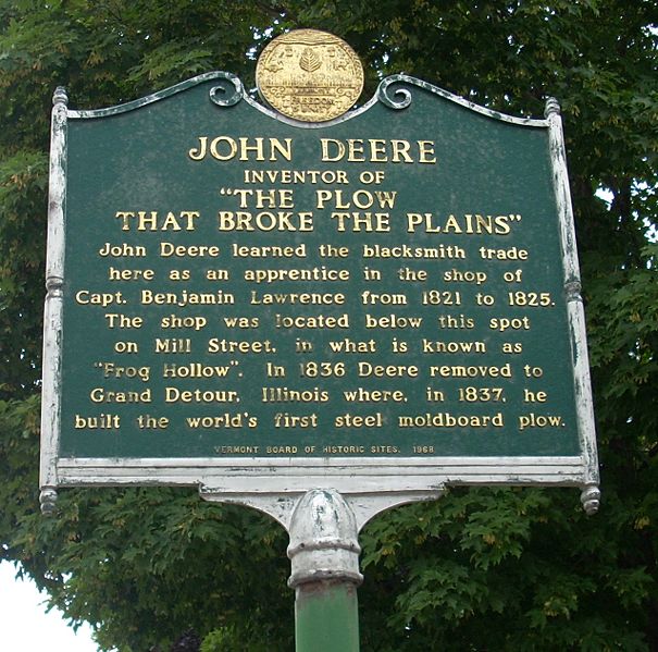 A historical marker marking the start of John Deere's career, located in Middlebury, Vermont, USA.
